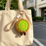 Cute Kiwi Slice Plush Keychain 🥝 Soft Fruit Shaped Stuffed Bag Charm with Smile & Tiny Legs | Bulk Wholesale for Gift & Accessory Shops - 图片 3